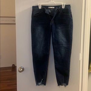 Boutique style jeans! Has fringed bottoms!